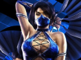 Olympische kunstschaatsmedaillewinnaars optreden als Sub-Zero en Kitana van Mortal Kombat