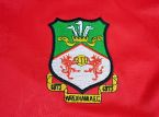 Wrexham werkt aan een recordtransfer van £ 5 miljoen om hun terugkeer naar de tweede divisie te markeren